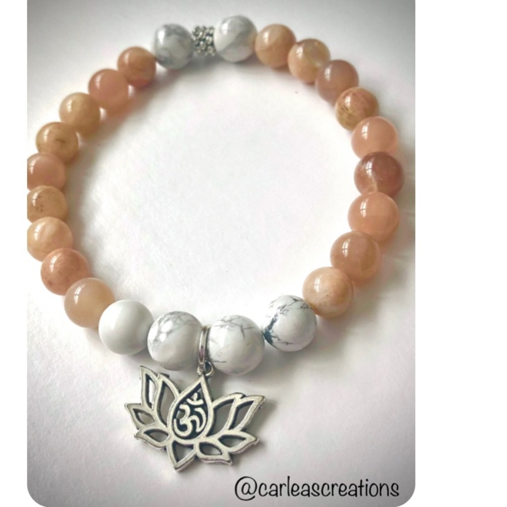 Bracelet with Lotus Ohm charm.